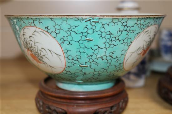 A group of Chinese porcelain and wood stands (10)